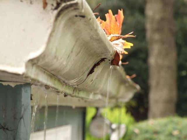 clogged gutters water overflowing 1679671910